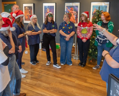 PAG committee get directions on welcoming the PAG Panto audience