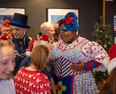 The cast mingle with the children