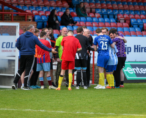 Charity Football Match 2026 - team huddle